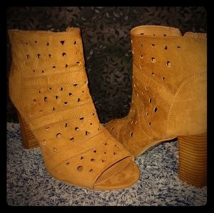 Laser cut peep toe booties